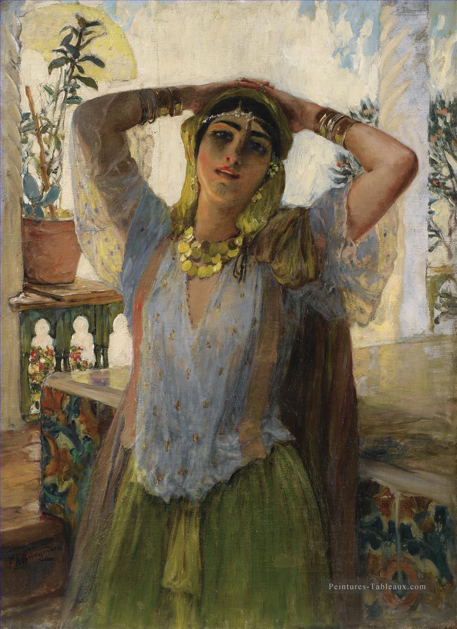 JEUNE FEMME ORIENTALE SUR UNE TERRASSE Frederick Arthur Bridgman Arabe Peintures à l'huile